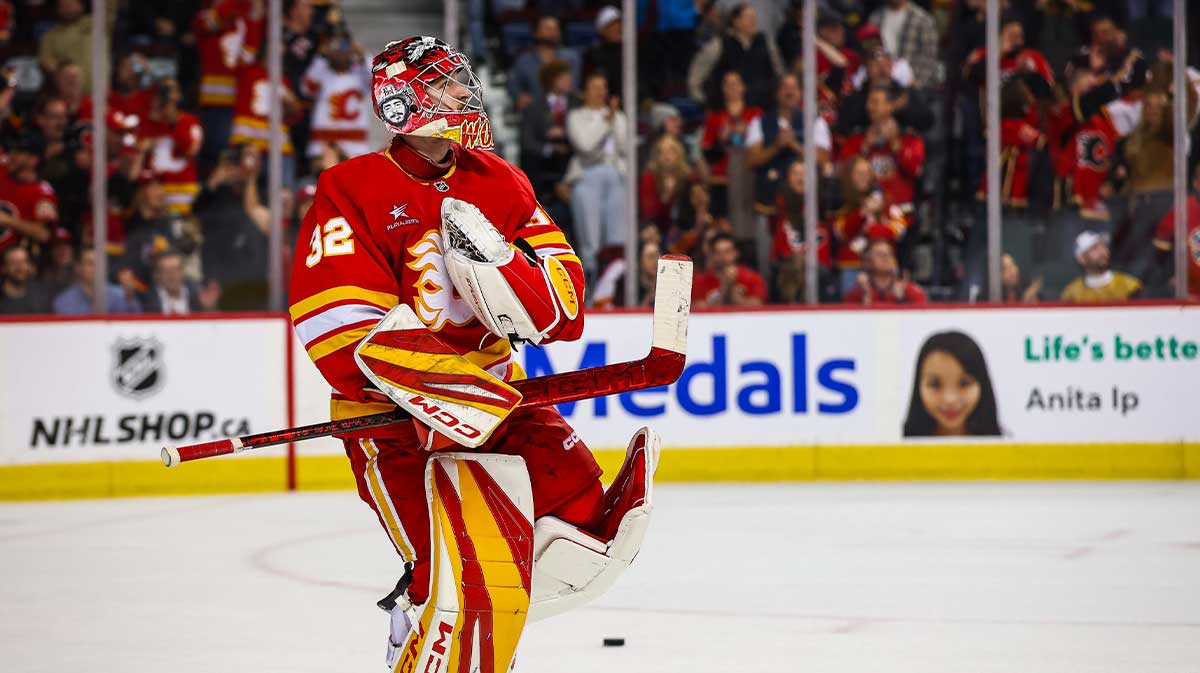 Calgary Flames goaltender Dustin Wolf (32) celebrates win after defeating Vegas Golden Knights at Scotiabank Saddledome.