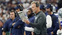 Dallas Cowboys defensive coordinator Matt Eberflus on the sideline during the first quarter at AT&T Stadium.