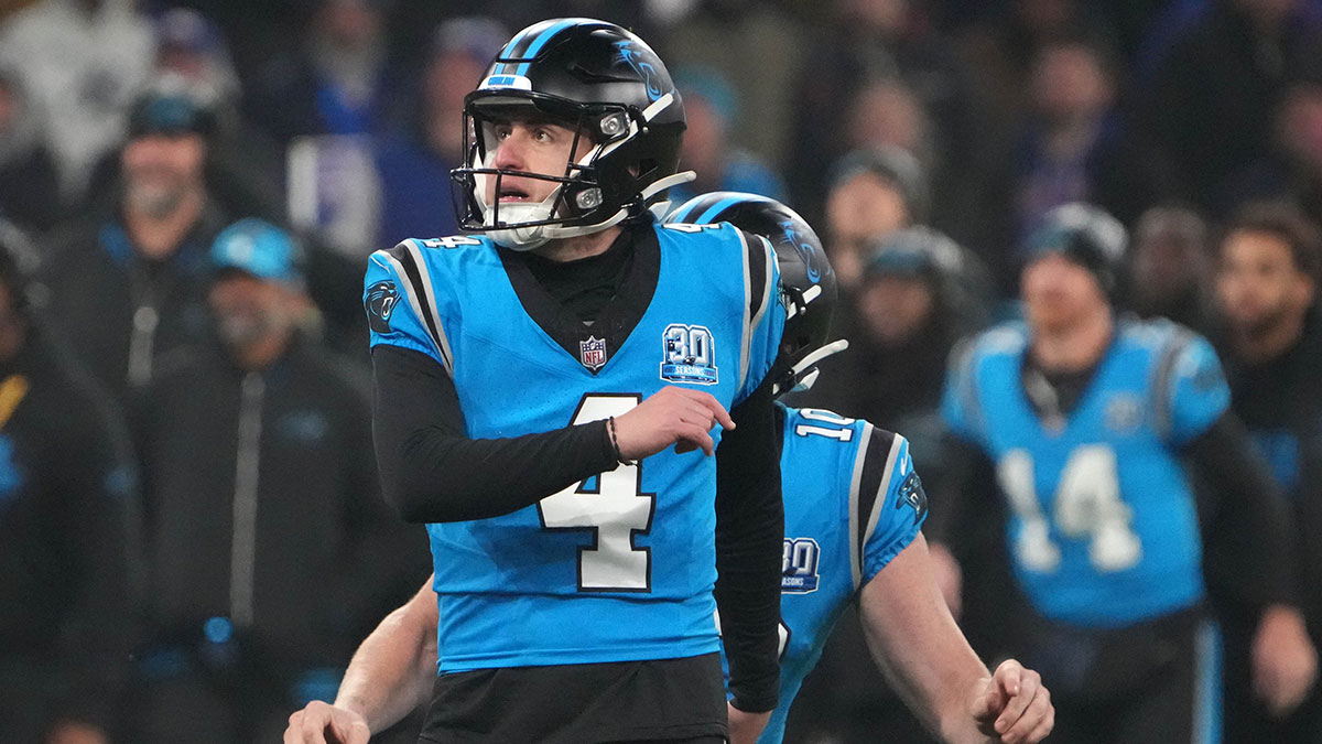 Carolina Panthers place kicker Eddy Pineiro (4) kicks a 36-yard field goal in overtime against the New York Giants during the 2024 NFL Munich Game at Allianz Arena.
