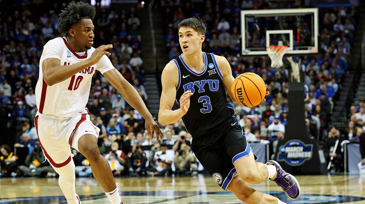 Brigham Young Cougars guard Egor Demin (3) drives to the basket against Alabama Crimson Tide forward Mouhamed Dioubate (10) during the first half during an East Regional semifinal of the 2025 NCAA tournament at Prudential Center.