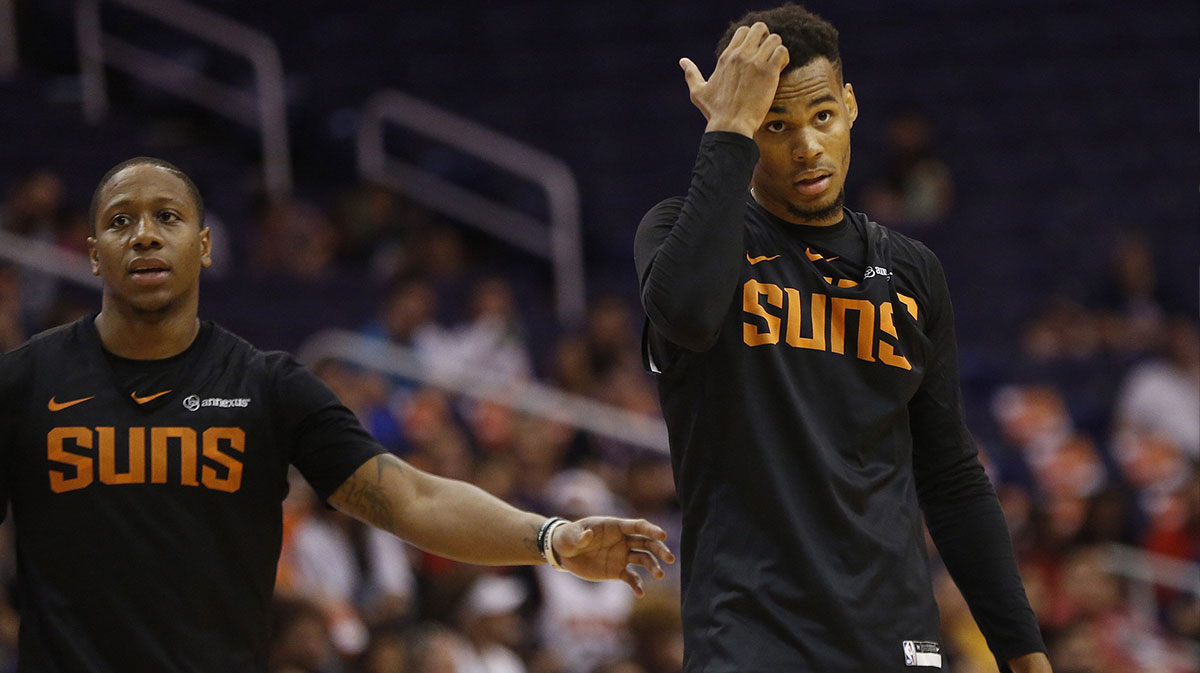 Suns Isaiah Canaan relieves Ellie Okobo on court during an Open Practice at Talking Stick Resort Arena in Phoenix, Ariz. on Sept. 29, 2018.