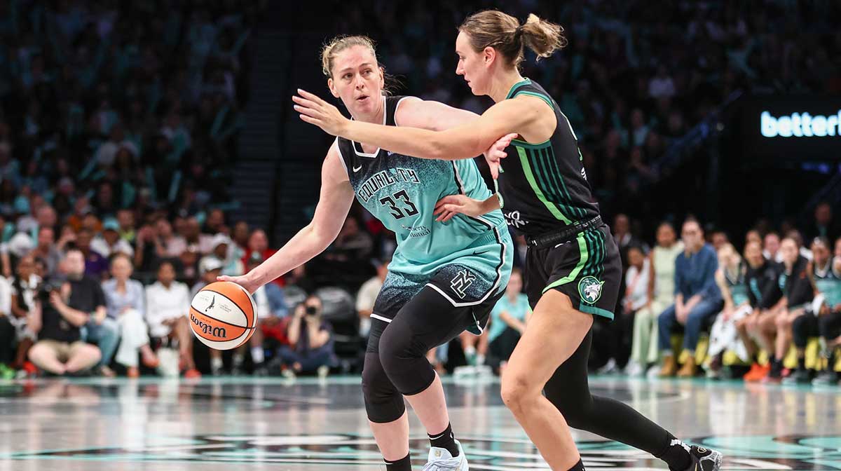 New York Liberty center Emma Meesseman (33) looks to drive past Minnesota Lynx forward Alanna Smith (8) in the fourth quarter at Barclays Center.