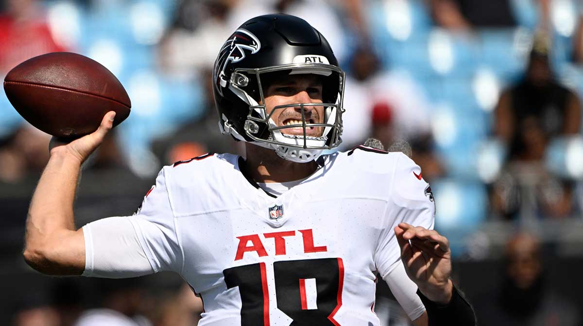 Atlanta Falcons quarterback Kirk Cousins (18) looks to pass in the fourth quarter at Bank of America Stadium.