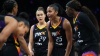 Phoenix Mercury forward Alyssa Thomas (25) huddles with her teammates during their WNBA semifinal playoff game against the Minnesota Lynx at PHX Arena on Sept. 28, 2025.