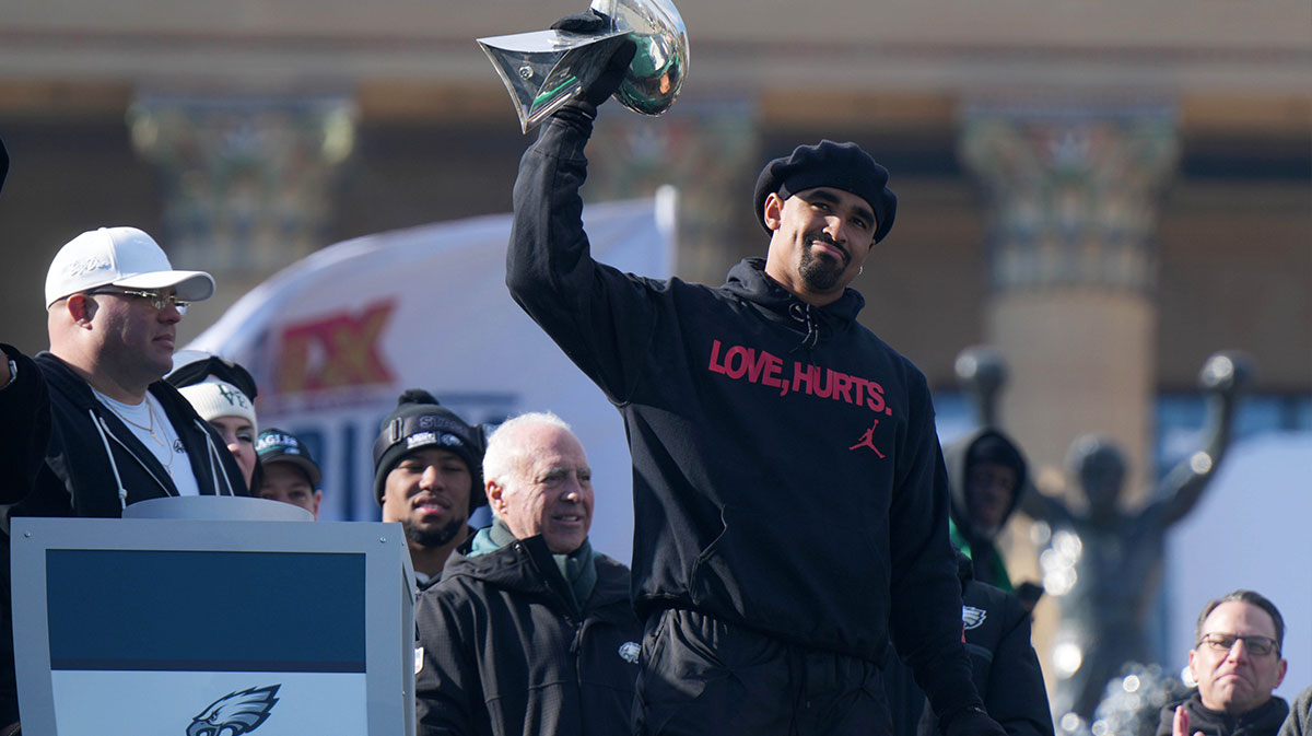 Philadelphia Eagles quarterback Jalen Hurts holds the Vince Lombardi Trophy during the Super Bowl LIX championship parade and rally. Mandatory Credit: Kirby Lee-Imagn Images