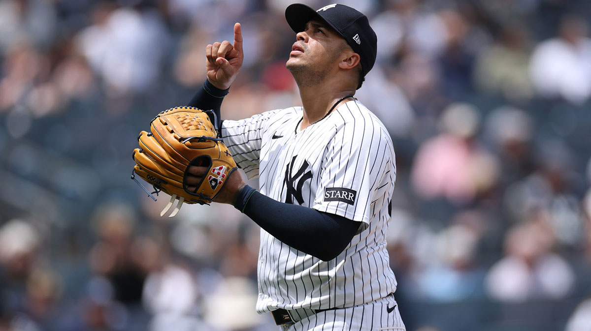 New York Yankees relief pitcher Fernando Cruz (63) reacts after striking out the side during the eighth inning against the Baltimore Orioles at Yankee Stadium. Mandatory Credit: Vincent Carchietta-Imagn Images