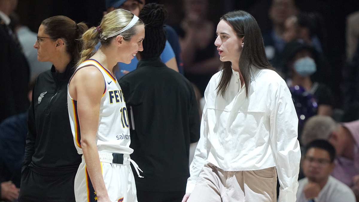 Fever guard Lexie Hull (10) and guard Caitlin Clark (right) talk before the game against the Golden State Valkyries at Chase Center