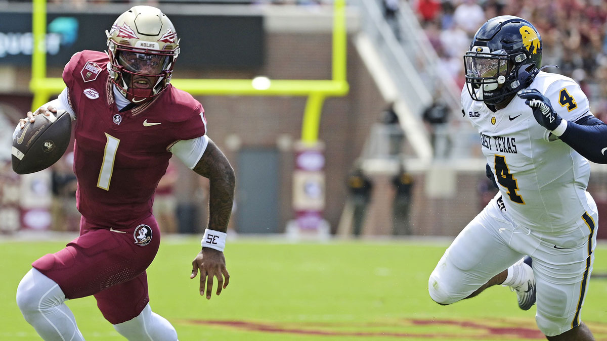 Florida State Seminoles quarterback Tommy Castellanos (1) runs the ball during the first half against the East Texas A&M Lions at Doak S. Campbell Stadium.