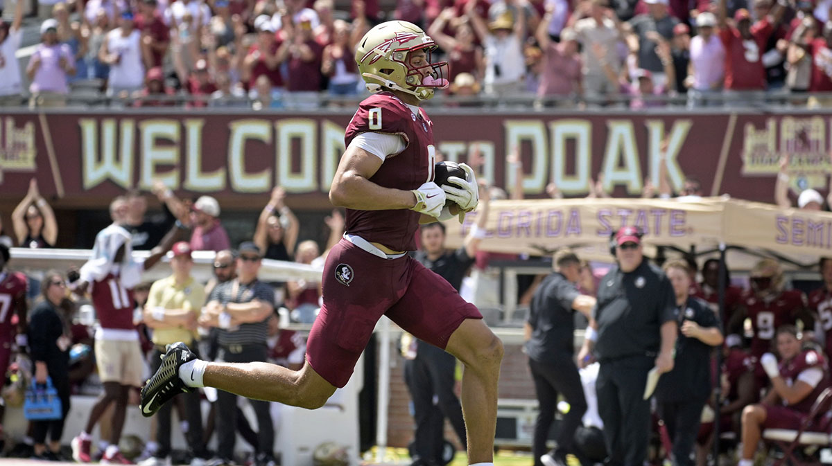 Florida State Seminoles wide receiver Duce Robinson (0) catches a touchdown during the first half against the East Texas A&M at Doak S. Campbell Stadium.