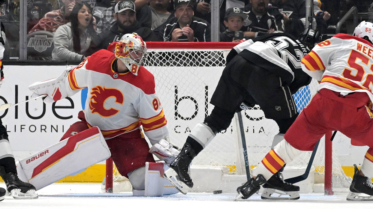 Los Angeles Kings forward Taylor Ward (52) scores past Calgary Flames goaltender Dan Vladar (80) in the third period at Crypto.com Arena.