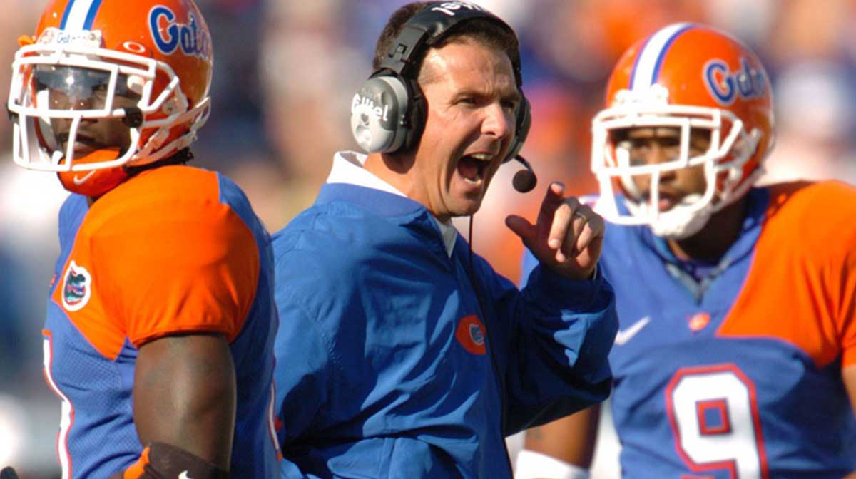 University of Florida head coach Urban Meyer hollers in approval as he reacts to the call on the fumble being overturned and the ball being returned to Florida with 5 minutes to play in the 2nd quarter of the Florida-Georgia game on Saturday, October 29, 2005, at Alltel Stadium in Jacksonville.
