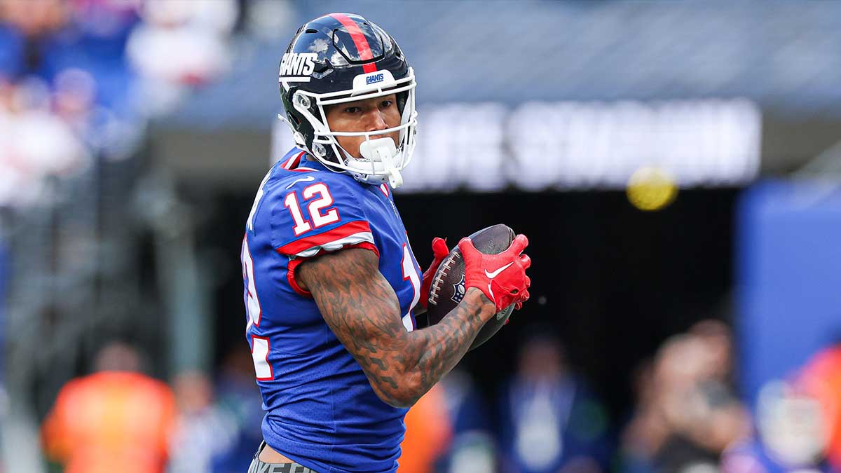 New York Giants tight end Darren Waller (12) catches the ball during the first half Washington Commanders at MetLife Stadium.