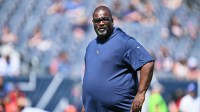 Tennessee Titans assistant head coach Terrell Williams watches his team warm up before a game against the Chicago Bears at Soldier Field.