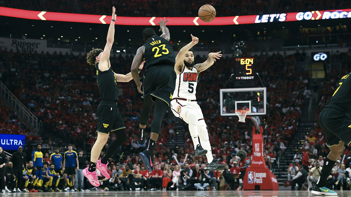 Houston Rockets guard Fred VanVleet (5) passes the ball during game seven of the first round for the 2025 NBA Playoffs against the Golden State Warriors at Toyota Center.