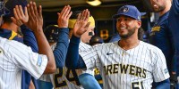 Milwaukee Brewers starting pitcher Freddy Peralta (51) is greeted in the dugout after pitching six plus innings against the Washington Nationals at American Family Field.