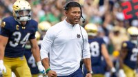 Notre Dame Fighting Irish head coach Marcus Freeman celebrates a turnover by the defense against the Purdue Boilermakers during the first half at Notre Dame Stadium.