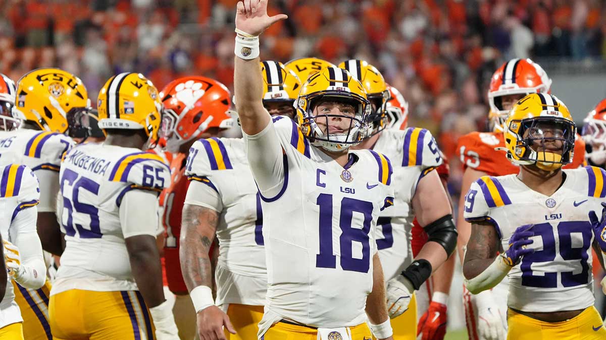 LSU Tigers quarterback Garrett Nussmeier (13) gestures after a play against the Clemson Tigers at Memorial Stadium.