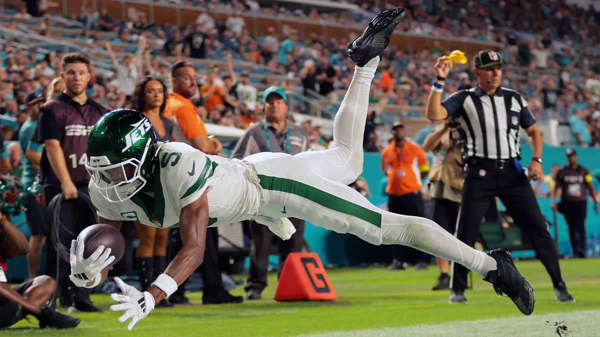 New York Jets wide receiver Garrett Wilson (5) attempts to make a catch against Miami Dolphins cornerback Artie Burns (not pictured) during the second half at Hard Rock Stadium. 