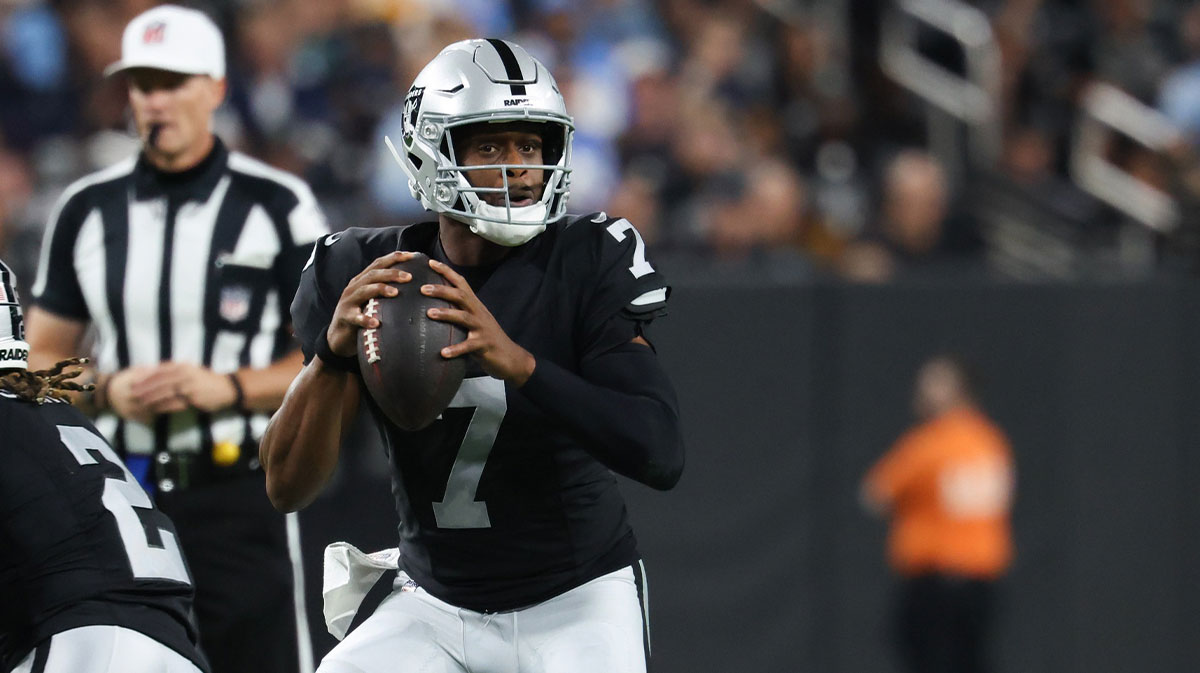 Las Vegas Raiders quarterback Geno Smith (7) drops back to pass during the first quarter against the Los Angeles Chargers at Allegiant Stadium.