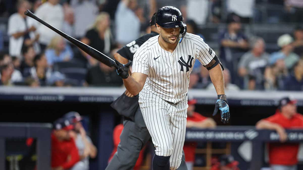 New York Yankees right fielder Giancarlo Stanton (27) hits a two run home run in the sixth inning against the Washington Nationals at Yankee Stadium.
