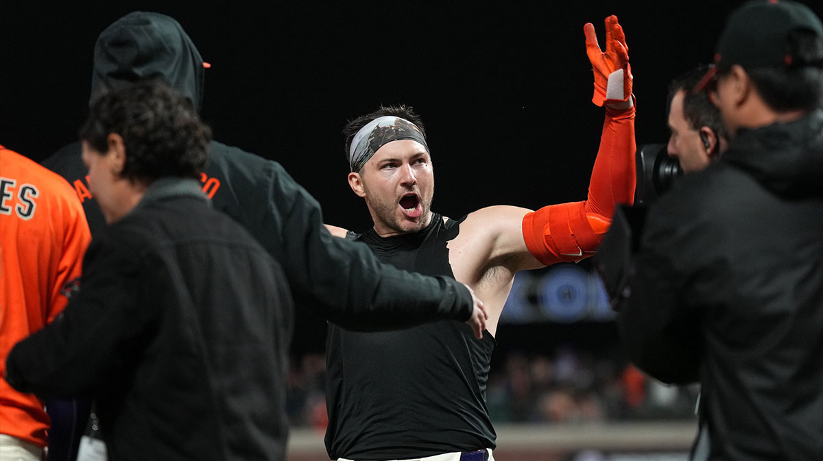 San Francisco Giants catcher Patrick Bailey (14) celebrates after hitting a walk off grand slam home run against the Los Angeles Dodgers during the tenth inning at Oracle Park.