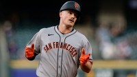 San Francisco Giants third baseman Matt Chapman (26) rounds the bases on a solo home run in the second inning against the Colorado Rockies at Coors Field.