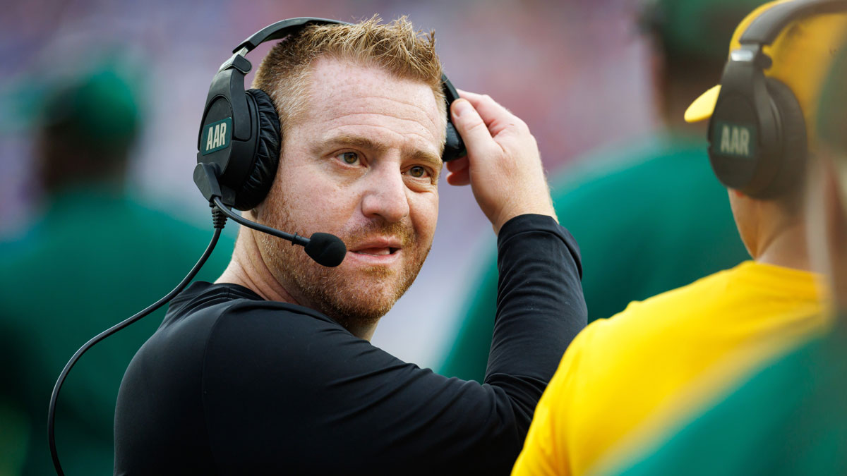 South Florida Bulls head coach Alex Golesh looks on against the Florida Gators during the first half at Ben Hill Griffin Stadium.