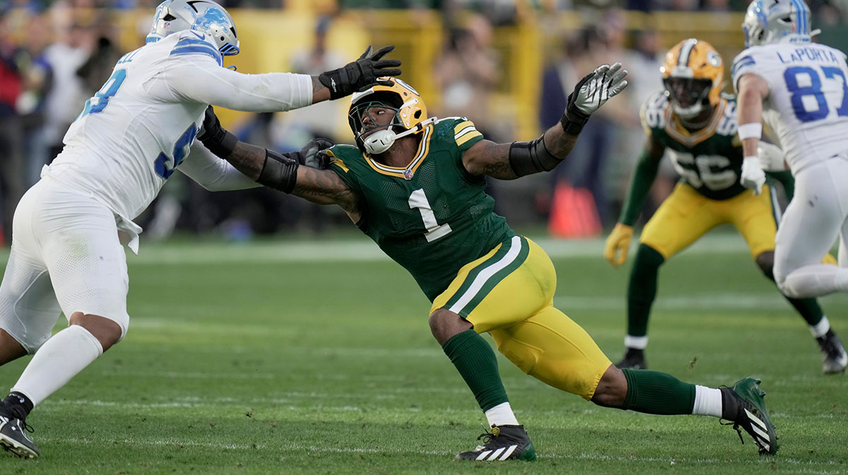 Detroit Lions offensive tackle Penei Sewell (58) blocks Green Bay Packers defensive end Micah Parsons (1) during the fourth quarter of their game Sunday, September 7, 2025 at Lambeau Field in Green Bay, Wisconsin. The Green Bay Packers beat the Detroit Lions 27-13.