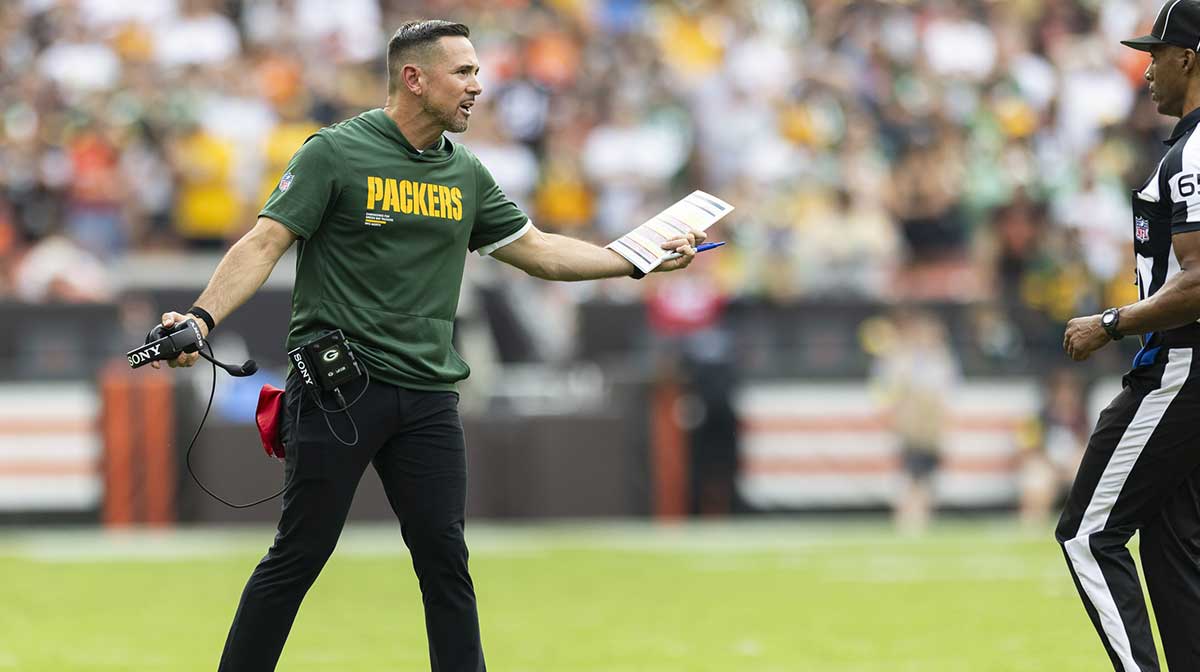 Green Bay Packers head coach Matt LaFleur argues a call with line judge Walt Coleman IV (65) during the fourth quarter at Huntington Bank Field.