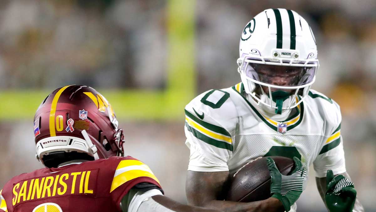 Green Bay Packers wide receiver Matthew Golden (0) against the Washington Commanders cornerback Mike Sainristil (0) on Thursday, September 11, 2025, at Lambeau Field in Green Bay, Wis. The Packers defeated the Commanders 27-18.