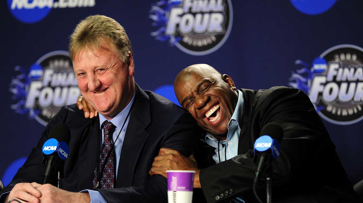 Magic Johnson (right) hugs NBA former player Larry Bird (left) during a press conference before the championship game of the Final Four in the 2009 NCAA mens basketball tournament against the North Carolina Tar Heels at Ford Field