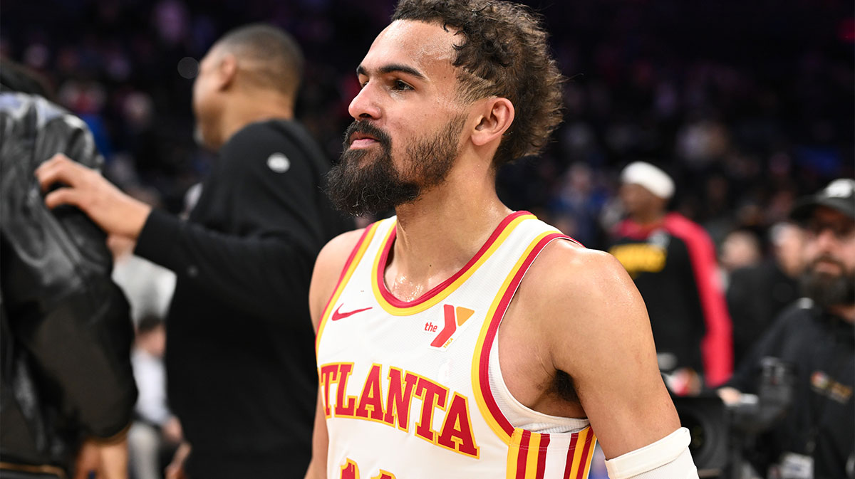 Hawks guard Trae Young (11) looks on after the game against the Philadelphia 76ers at Wells Fargo Center with Patrick Beverley in the background