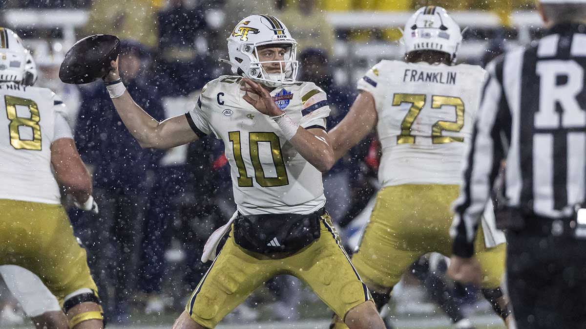 Georgia Tech Yellow Jackets quarterback Haynes King (10) looks to throw against the Vanderbilt Commodores during the second half of the 2024 Birmingham Bowl at Protective Stadium.