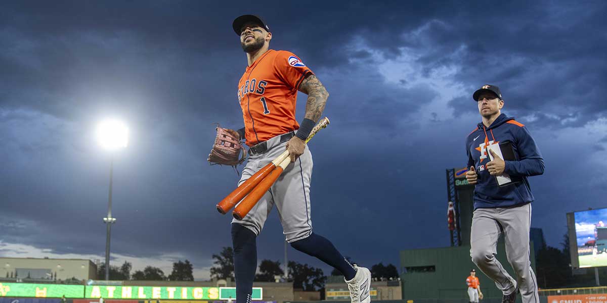 Houston Astros shortstop Carlos Correa (1) jogs towards the dugout before the start of the game against the Athletics at Sutter Health Park