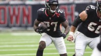 Houston Texans running back Woody Marks (27) runs with the ball during the fourth quarter against the Tennessee Titans