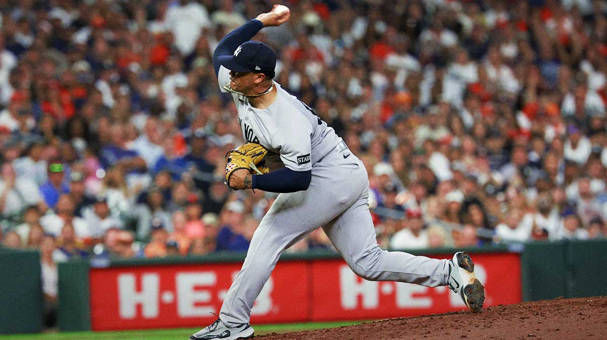 New York Yankees relief pitcher Fernando Cruz (63) pitches against the Houston Astros in the seventh inning at Daikin Park. Mandatory Credit: Thomas Shea-Imagn Images
