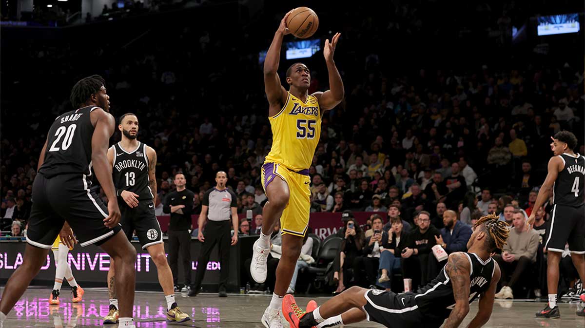 Los Angeles Lakers center Trey Jemison III (55) commits an offensive foul against Brooklyn Nets forward Noah Clowney (21) during the first quarter at Barclays Center.