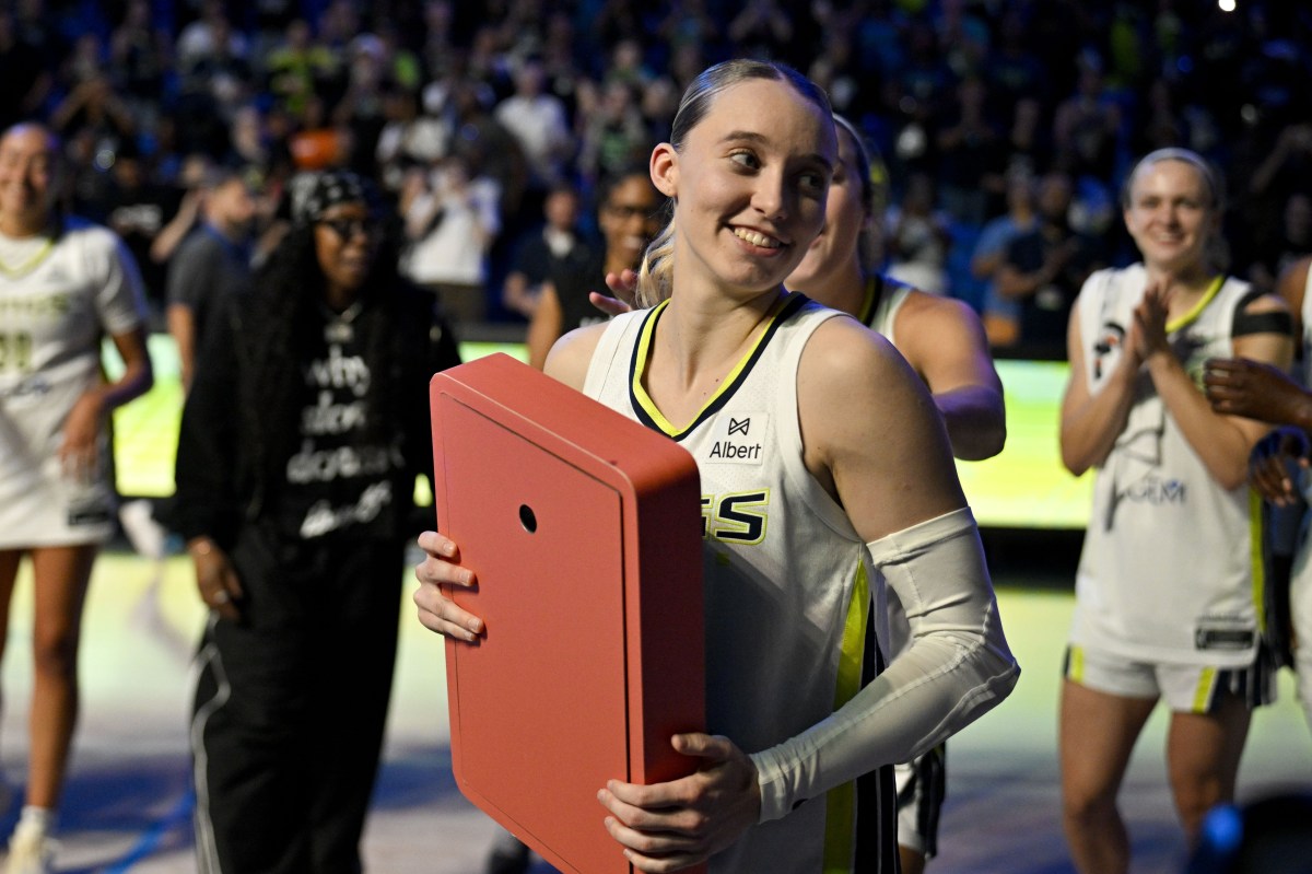 Dallas Wings guard Paige Bueckers (5) smiles after the game against the Phoenix Mercury at College Park Center.
