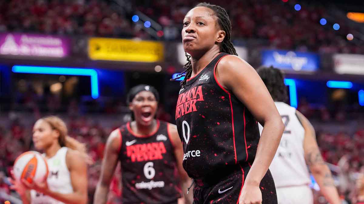 Indiana Fever guard Kelsey Mitchell (0) celebrates Tuesday, Sept. 16, 2025, during Game 2 of a WNBA playoff matchup between the Indiana Fever and the Atlanta Dream at Gainbridge Fieldhouse in Indianapolis. The Indiana Fever defeated the Atlanta Dream, 77-60.