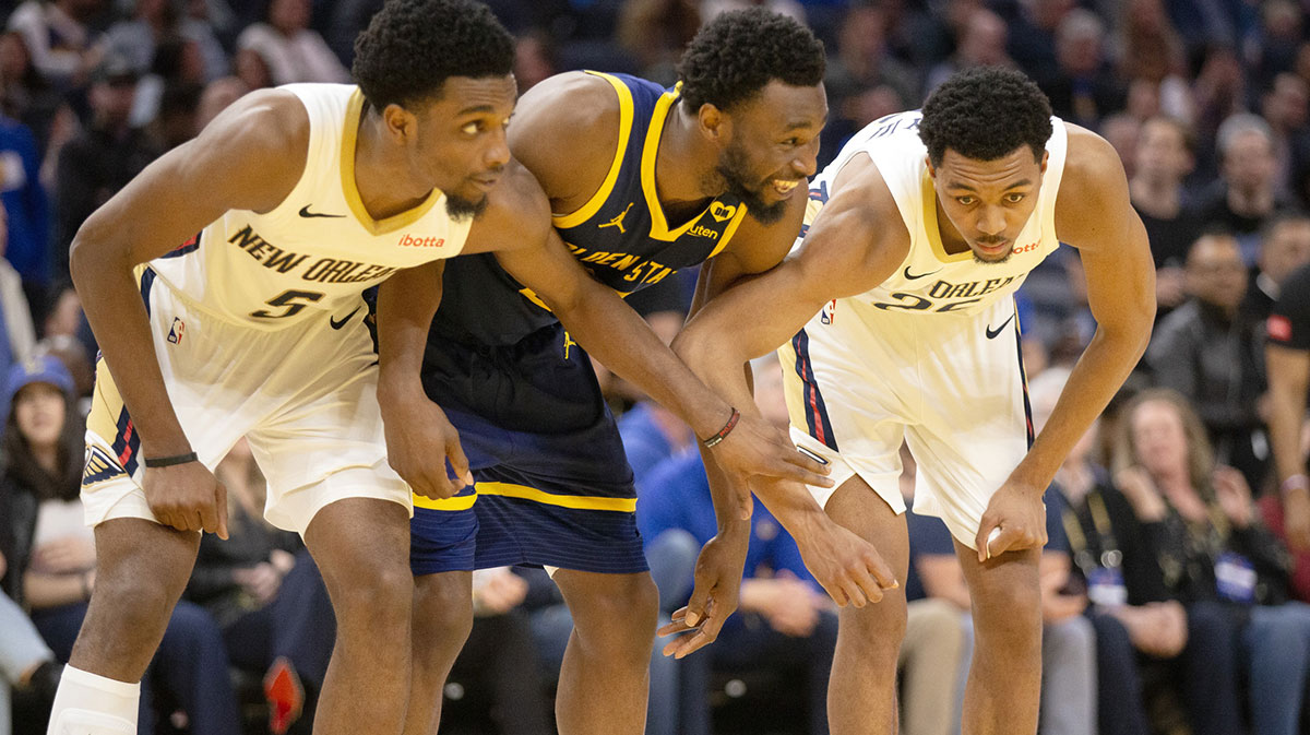New Orleans Pelicans forwards Herbert Jones (5) and Trey Murphy III (25) await a foul shot with Golden State Warriors forward Andrew Wiggins (22) during the fourth quarter at Chase Center.