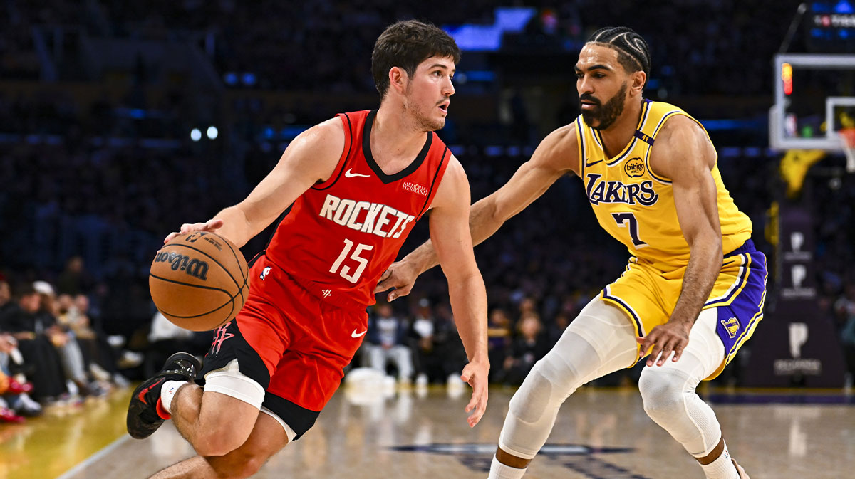 Houston Rockets guard Reed Sheppard (15) drives the ball against Los Angeles Lakers guard Gabe Vincent (7) during the second half at Crypto.com Arena.