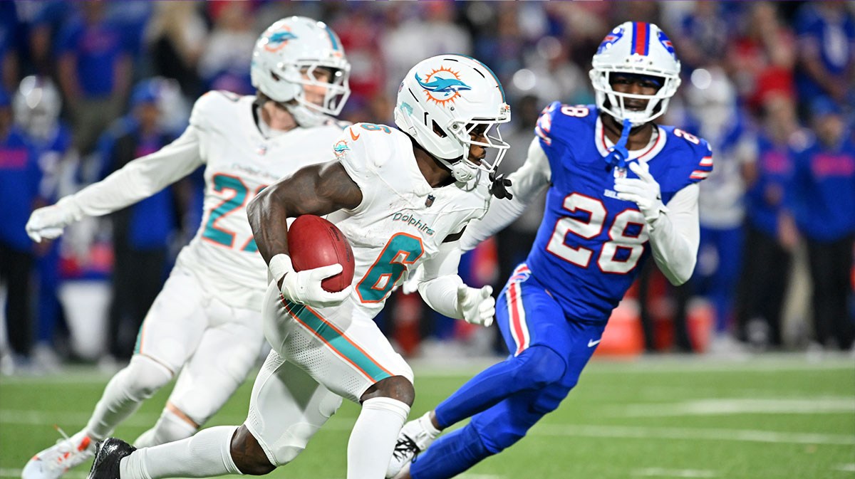 Miami Dolphins wide receiver Malik Washington (6) runs against Buffalo Bills defensive back Sam Franklin Jr.