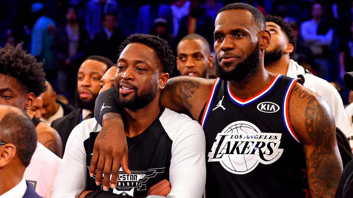 Team Lebron forward Lebron James of the Los Angeles Lakers (23) and Team Lebron guard Dwayne Wade of the Miami Heat (3) after the 2019 NBA All-Star Game at Spectrum Center.