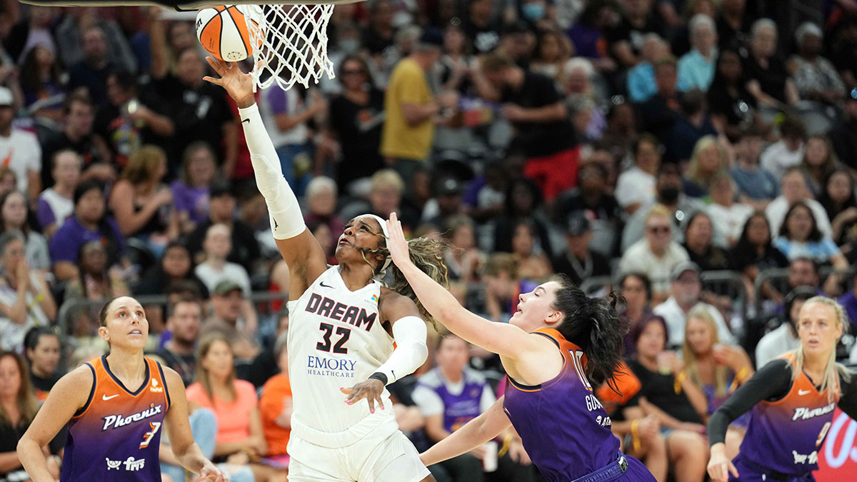Atlanta Dream forward Cheyenne Parker (32) puts up a layup against Phoenix Mercury center Megan Gustafson (10) during the second half at Footprint Center.