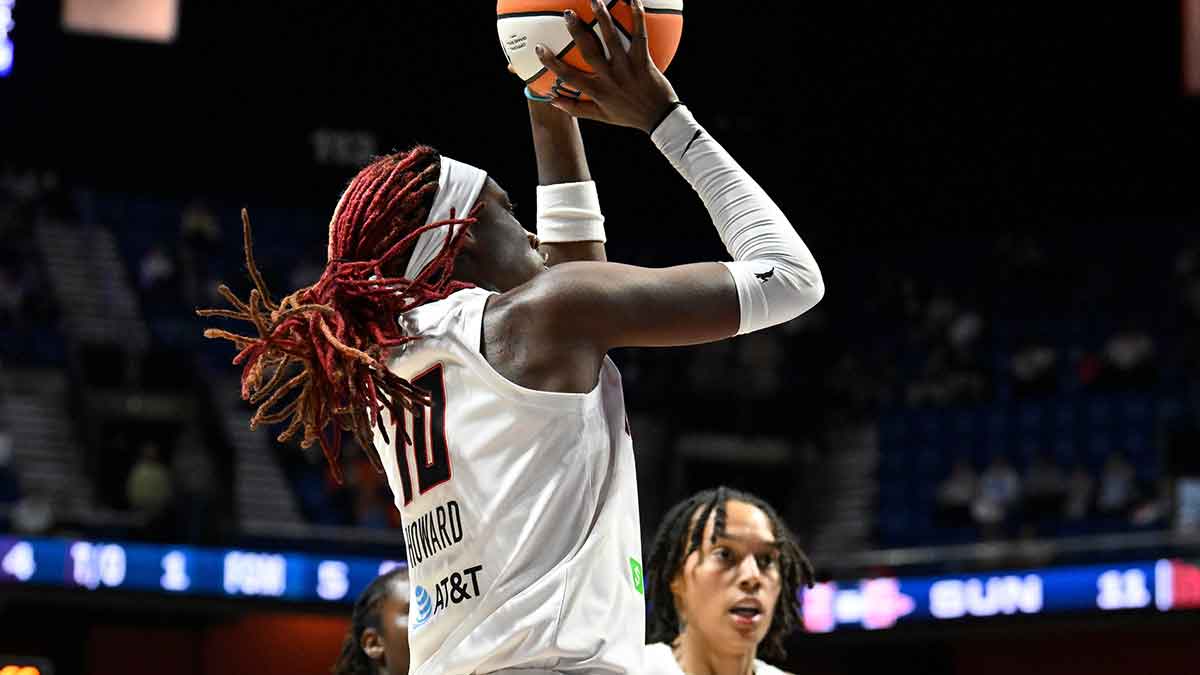 Atlanta Dream guard Rhyne Howard (10) shoots the ball against the Connecticut Sun during the first half at Mohegan Sun Arena.
