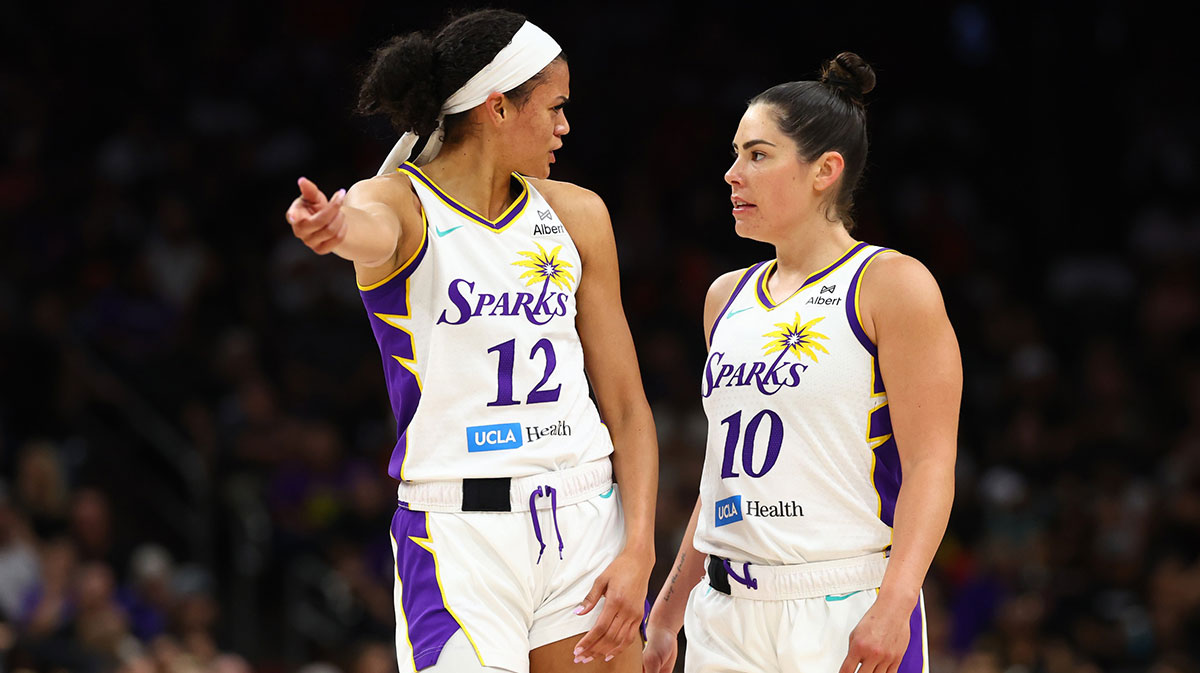 Los Angeles Sparks guard Kelsey Plum (10) with guard Rae Burrell (12) against the Phoenix Mercury during a WNBA game at PHX Arena.