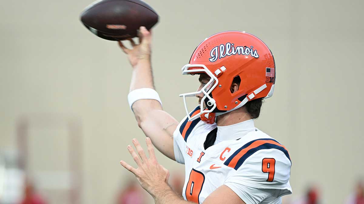 llinois Fighting Illini quarterback Luke Altmyer (9) warms up prior to the game against the Indiana Hoosiers at Memorial Stadium. 