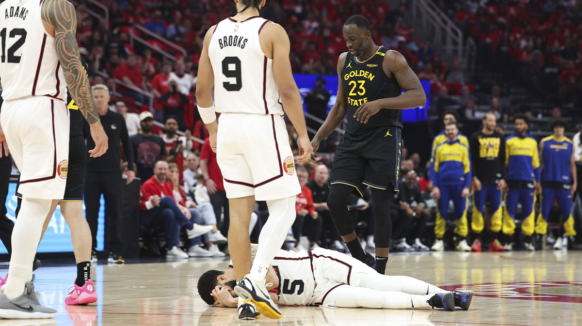 Golden State Warriors forward Draymond Green (23) reacts and Houston Rockets guard Fred VanVleet (5) holds his hands over his face after a play during the second quarter of game seven of the first round for the 2025 NBA Playoffs at Toyota Center.