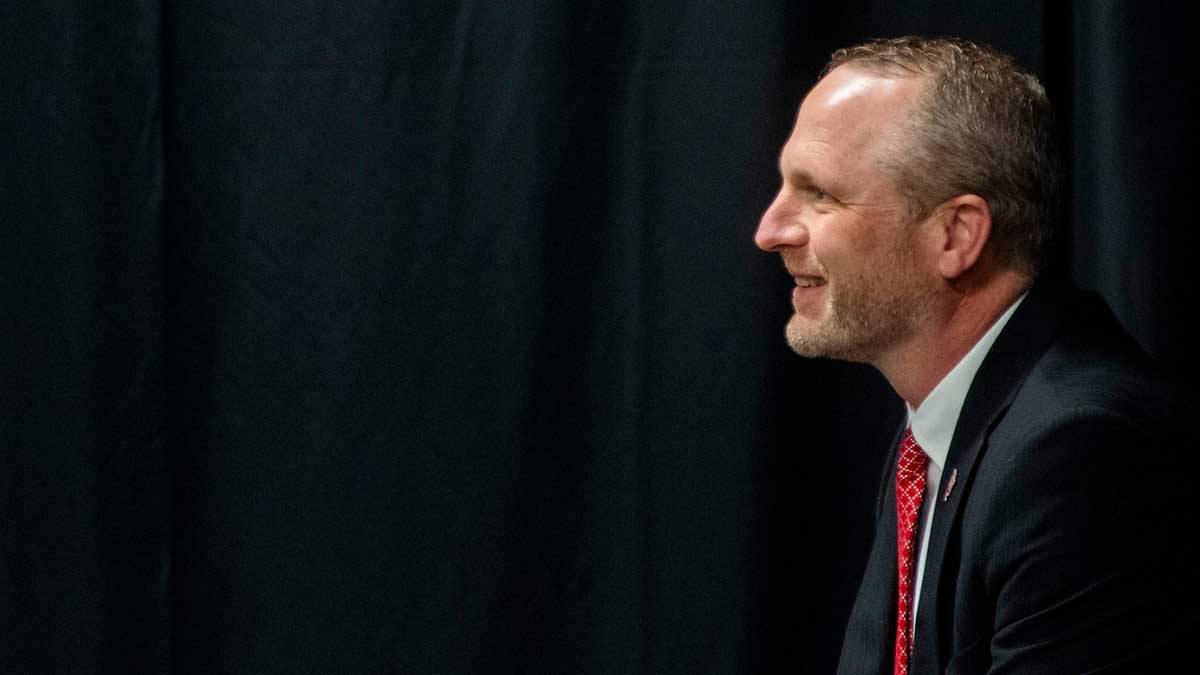 New Indiana University Men's Basketball Head Coach Darian DeVries waits to be introduced at the introductory press conference.