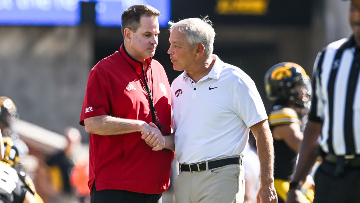 Iowa Hawkeyes head coach Kirk Ferentz and Indiana Hoosiers head coach Curt Cignetti shake hands before the game at Kinnick Stadium.